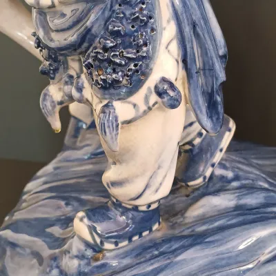 LOT 227: Bombay Blue and White Porcelain Figurine