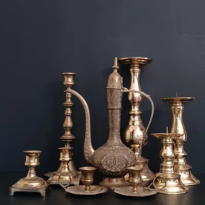 LOT 235: Etched Brass Aftaba Ewer with Brass Candle Holders