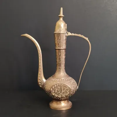 LOT 235: Etched Brass Aftaba Ewer with Brass Candle Holders