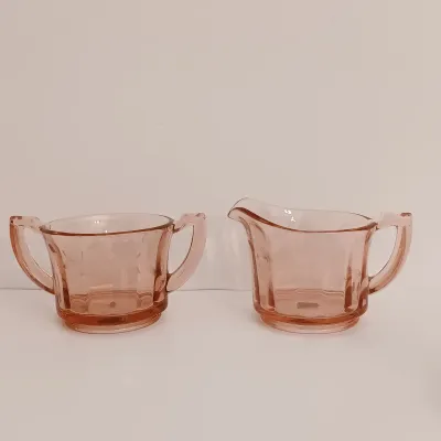 LOT 216: Collection of Pink Depression Glass - Pitcher, Juicer, Creamer and Sugar Bowl