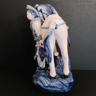 LOT 227: Bombay Blue and White Porcelain Figurine