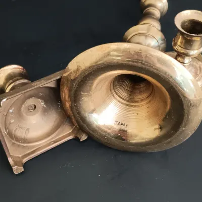 LOT 235: Etched Brass Aftaba Ewer with Brass Candle Holders