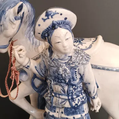 LOT 227: Bombay Blue and White Porcelain Figurine