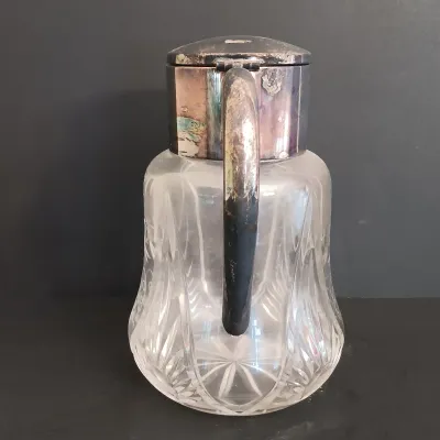 LOT 231: Vintage Crystal Pitcher with Metal Bird Claw Ice Tongs & Glass Ladles