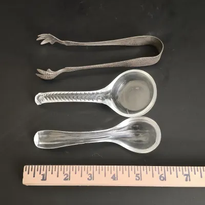 LOT 231: Vintage Crystal Pitcher with Metal Bird Claw Ice Tongs & Glass Ladles