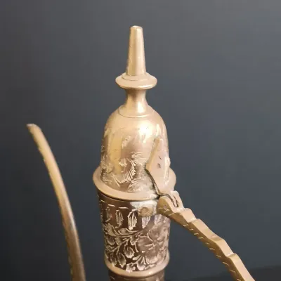 LOT 235: Etched Brass Aftaba Ewer with Brass Candle Holders