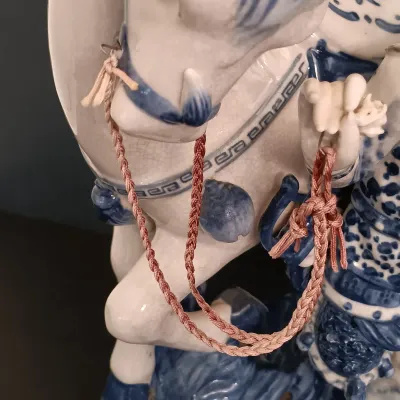LOT 227: Bombay Blue and White Porcelain Figurine