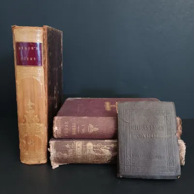 LOT 206: Leatherbound Bronte's Poems, Mini Leatherbound Christmas Carol, Longfellow's Prose Works 1866 and Whittier's...