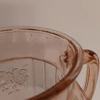 LOT 216: Collection of Pink Depression Glass - Pitcher, Juicer, Creamer and Sugar Bowl