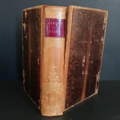 LOT 206: Leatherbound Bronte's Poems, Mini Leatherbound Christmas Carol, Longfellow's Prose Works 1866 and Whittier's...