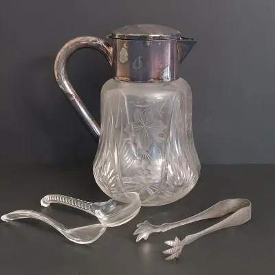 LOT 231: Vintage Crystal Pitcher with Metal Bird Claw Ice Tongs & Glass Ladles