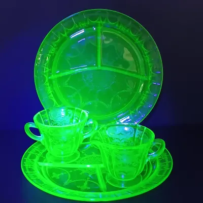 LOT 198: Uranium Glass Cameo Ballerina Pattern Divided Plates, Creamer & Open Sugar Bowl