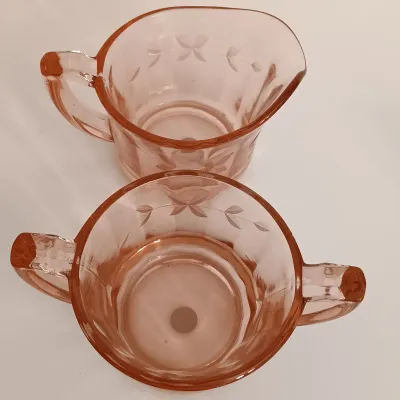 LOT 216: Collection of Pink Depression Glass - Pitcher, Juicer, Creamer and Sugar Bowl