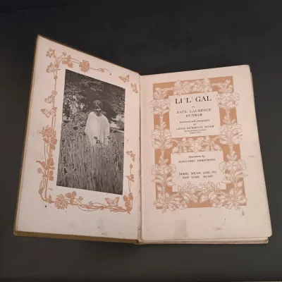 LOT 207: Collection of Antique Books: Li"l" Gal by Paul L Dunbar, The Castle & The Cottage by E. Perring, Songs of Sierra...