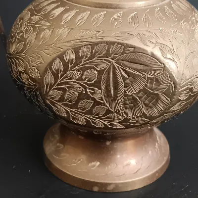 LOT 235: Etched Brass Aftaba Ewer with Brass Candle Holders