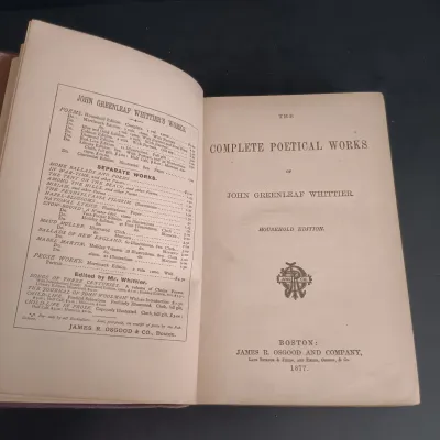 LOT 206: Leatherbound Bronte's Poems, Mini Leatherbound Christmas Carol, Longfellow's Prose Works 1866 and Whittier's...