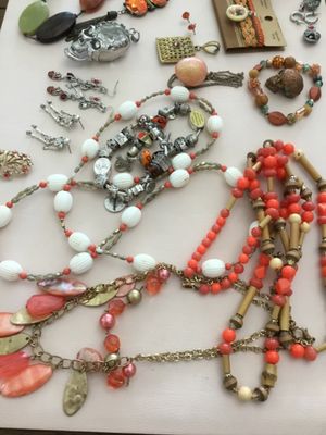 Orange, vintage and costume, fashion, jewelry, bracelets, pinions, earrings, charm, bracelets, broochs, etc. all in very good condition