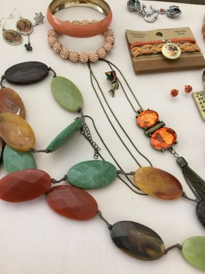 Orange, vintage and costume, fashion, jewelry, bracelets, pinions, earrings, charm, bracelets, broochs, etc. all in very good condition