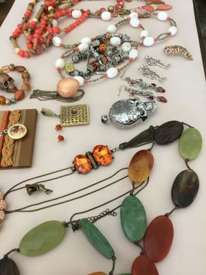Orange, vintage and costume, fashion, jewelry, bracelets, pinions, earrings, charm, bracelets, broochs, etc. all in very good condition