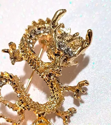 **NEW ARRIVAL** All Gold Colored "DRAGON & CRYSTAL BALL" BROOCH (2" x 1¼") with Yellow "Crystal Ball"...