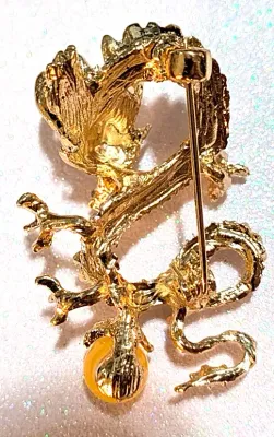 **NEW ARRIVAL** All Gold Colored "DRAGON & CRYSTAL BALL" BROOCH (2" x 1¼") with Yellow "Crystal Ball"...