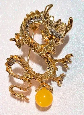 **NEW ARRIVAL** All Gold Colored "DRAGON & CRYSTAL BALL" BROOCH (2" x 1¼") with Yellow "Crystal Ball"...