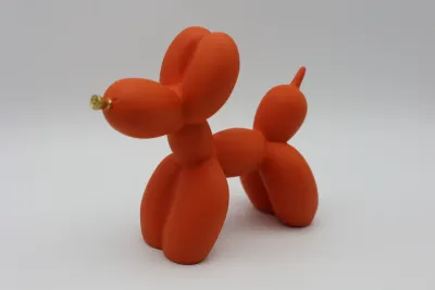 Modern Orange Balloon Dog Sculpture with Gold Nose