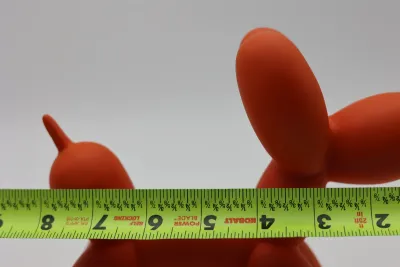 Modern Orange Balloon Dog Sculpture with Gold Nose