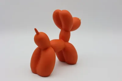Modern Orange Balloon Dog Sculpture with Gold Nose