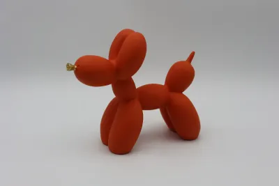 Modern Orange Balloon Dog Sculpture with Gold Nose