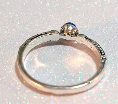 **NEW ARRIVAL** Size 9 Delicate ACRYLIC BLUE ROUND OPAQUE STONE RING with "Silver Rope" Side Band on a Silver Tone Setting (2.0g)