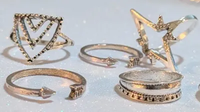 **NEW ARRIVAL** Sizes 3 to 8 Collection of 7 Silver Colored Rings in Assorted Styles and "Rough-Hewn Settings (8.9g)