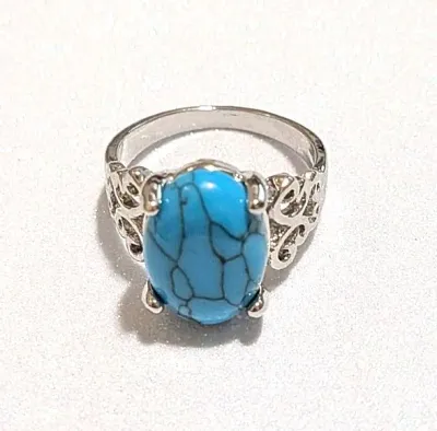 **NEW ARRIVAL** Size 7 "CRACKLED" BLUE OVAL TURQUOISE STYLE RING with Side OPEN SWIRLS Band on a Silver Tone Setting (4.1g)