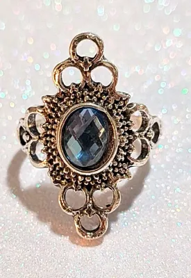 **NEW ARRIVAL** Size 8¼ Oval Beveled BLUE IRIDESCENT STONE RING with 4 Triple Circles Surround on a Silver Tone Setting (3.4g)