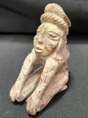 HAND-CARVED STONE FIGURINE 