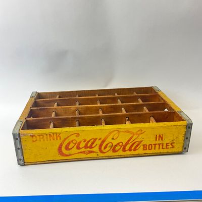 Vintage yellow wooden Coca-Cola crate
