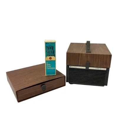 Vintage Bell & Howell Slide Cube Projector with Cartridges and Storage Case