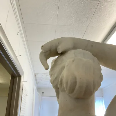 Classical-Style Carved Marble Male Nude Sculpture on Composite Pedestal