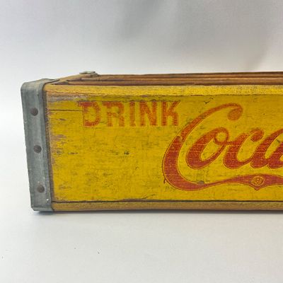 Vintage yellow wooden Coca-Cola crate
