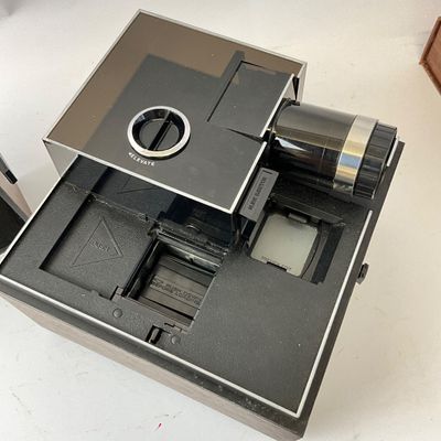 Vintage Bell & Howell Slide Cube Projector with Cartridges and Storage Case