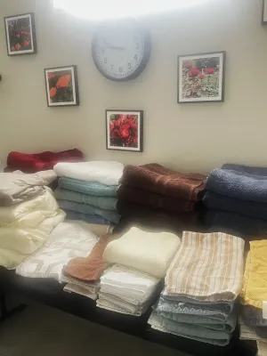 Assortment of folded bath towels, hand towels, and washcloths.