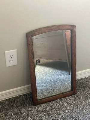 Vintage Mission-style oak wall mirror.