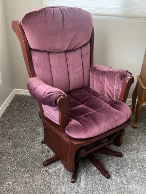 Vintage wooden swivel glider rocker.