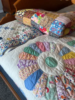 Collection of vintage handmade quilts.