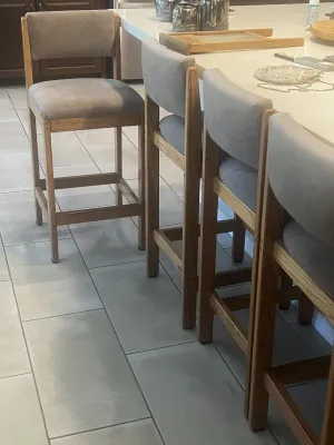 Set of four contemporary oak barstools.