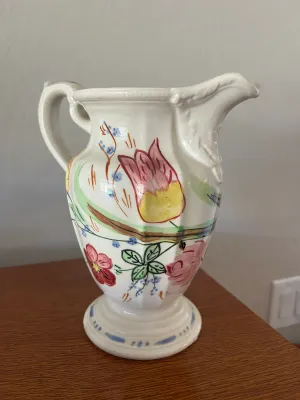 Vintage hand-painted ceramic pitcher.