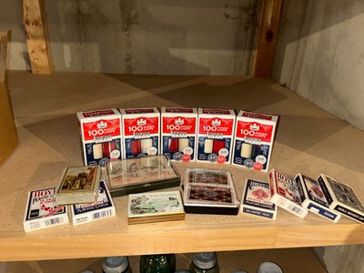 POKER CHIPS AND SEVERAL DECKS OF CARDS