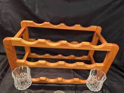 LEAD CRYSTAL STEMMED GLASSES, WINE RACK, AND TWO CANDLESTICK HOLDERS