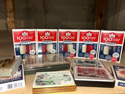 POKER CHIPS AND SEVERAL DECKS OF CARDS