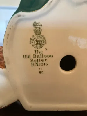 Porcelain Royal Doulton " The Old Balloon Seller"